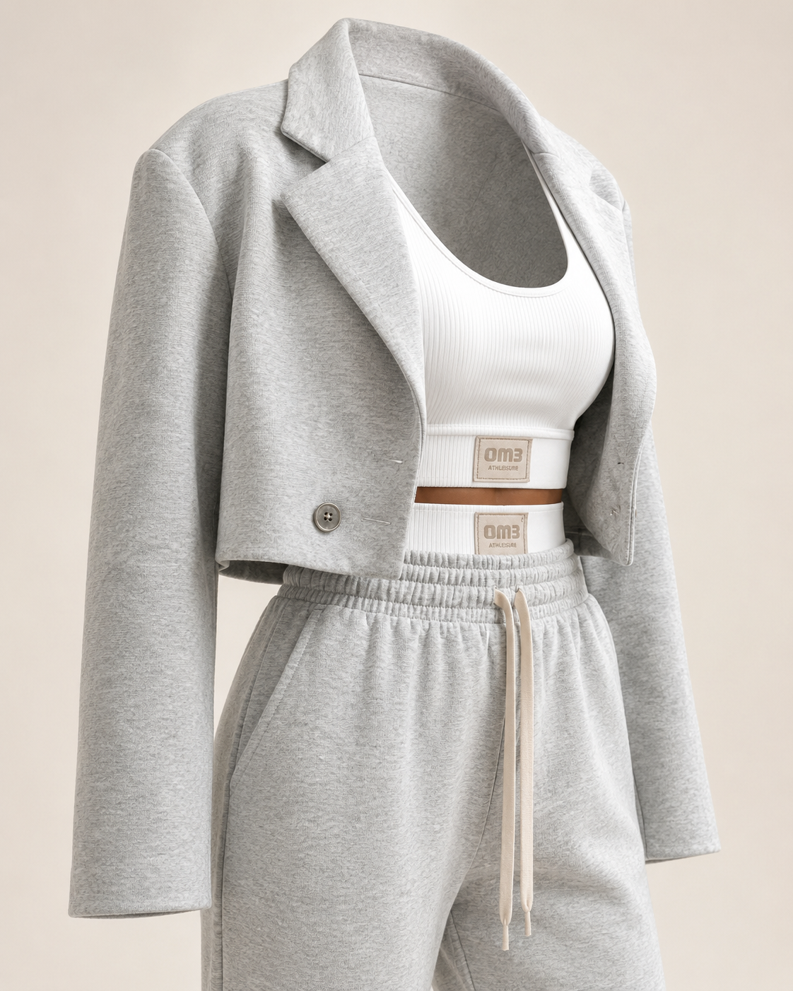 SHELLA — Ensemble athleisure 3 pièces : veste blazer courte, top court côtelé blanc & jogger taille haute gris chiné / 3-Piece Luxe Athleisure Set: Cropped Blazer, Ribbed Crop Top & Joggers / طقم رياضي أنيق من 3 قطع: بليزر قصير وتوب قصير مضلّع أبيض وبنطلون جوجر رمادي