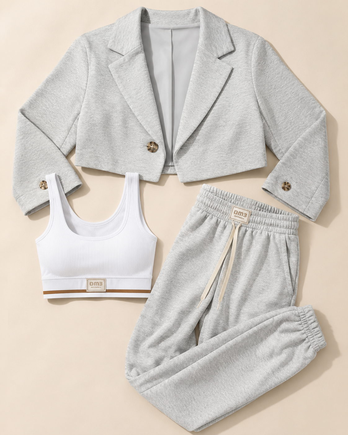 SHELLA — Ensemble athleisure 3 pièces : veste blazer courte, top court côtelé blanc & jogger taille haute gris chiné / 3-Piece Luxe Athleisure Set: Cropped Blazer, Ribbed Crop Top & Joggers / طقم رياضي أنيق من 3 قطع: بليزر قصير وتوب قصير مضلّع أبيض وبنطلون جوجر رمادي