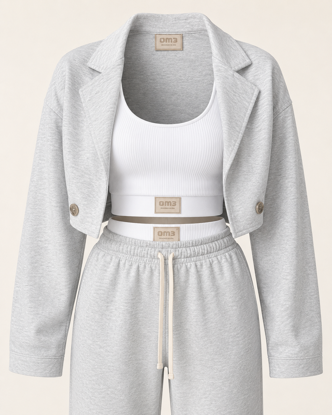 SHELLA — Ensemble athleisure 3 pièces : veste blazer courte, top court côtelé blanc & jogger taille haute gris chiné / 3-Piece Luxe Athleisure Set: Cropped Blazer, Ribbed Crop Top & Joggers / طقم رياضي أنيق من 3 قطع: بليزر قصير وتوب قصير مضلّع أبيض وبنطلون جوجر رمادي