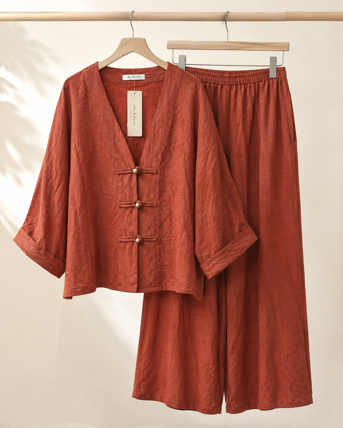 SHELLA — Ensemble en lin : top col V à boutons brandebourgs & pantalon large / Linen-Blend Frog Button Co-Ord Set: V-Neck Top & Wide-Leg Pants / طقم من الكتان: توب برقبة V بأزرار صينية وبنطلون واسع