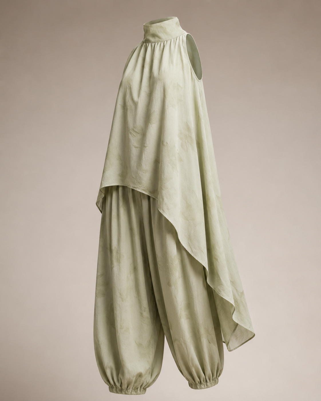 SHELLA — Ensemble vert sauge : tunique sans manches à col montant & ourlet asymétrique avec pantalon sarouel / Sage Green Asymmetrical Tunic & Harem Pants Co-Ord Set / طقم أخضر مريمي: تونيك بدون أكمام برقبة عالية وحاشية غير متماثلة وسروال هارم