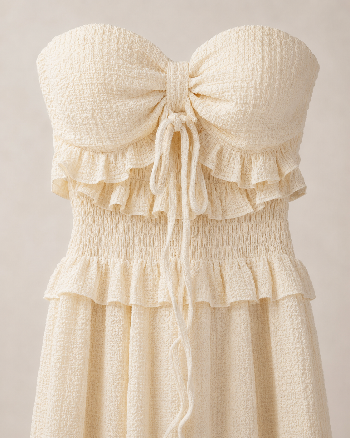 SHELLA — Robe longue bustier à nœud et volants texturée / Strapless Textured Bow Front Ruffle Maxi Dress / فستان طويل بدون أكتاف بعقدة وكشكشة
